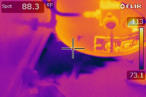 This image shows evidence of a leak at a water heater that was overlooked by the homeowner before the thermal imaging scan was conducted prior to sale.