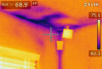 This image shows where a leak had occurred in a bathroom on the second floor. This was undetectable without the thermal image scan. The leak had been repaired, but damage was still evident at the first floor ceiling